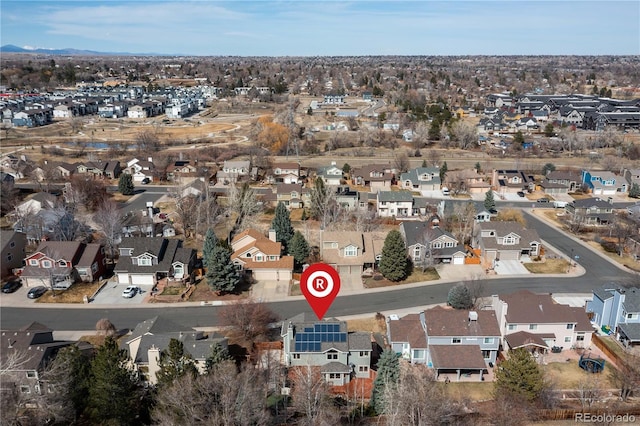 drone / aerial view with a residential view