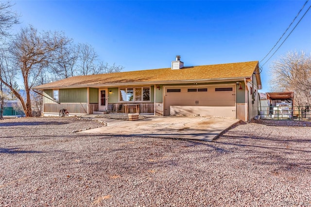 ranch-style home with a garage