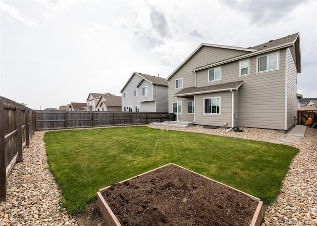 9835 Rubicon Dr, Colorado Springs, CO 80925 - back of house with a garden