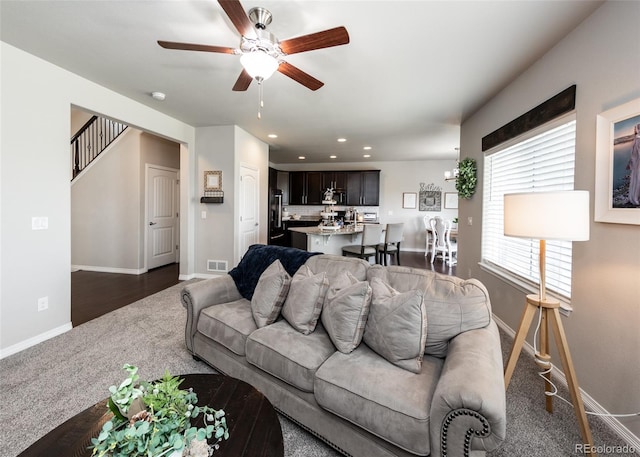 9835 Rubicon Dr, Colorado Springs, CO 80925 - living room featuring dark colored carpet, baseboards, a ceiling fan, and recessed lighting