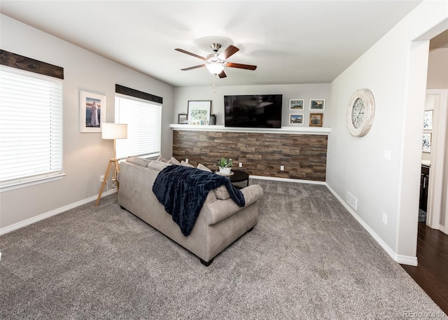 9835 Rubicon Dr, Colorado Springs, CO 80925 - carpeted living area featuring ceiling fan and baseboards