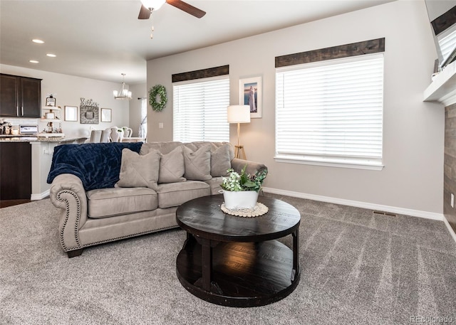 9835 Rubicon Dr, Colorado Springs, CO 80925 - living room with a ceiling fan, carpet, a chandelier, baseboards, and recessed lighting