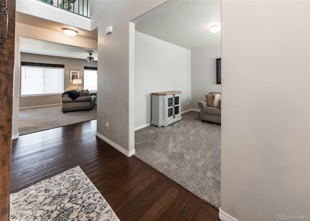 9835 Rubicon Dr, Colorado Springs, CO 80925 - hall with baseboards, hardwood / wood-style flooring, and carpet floors