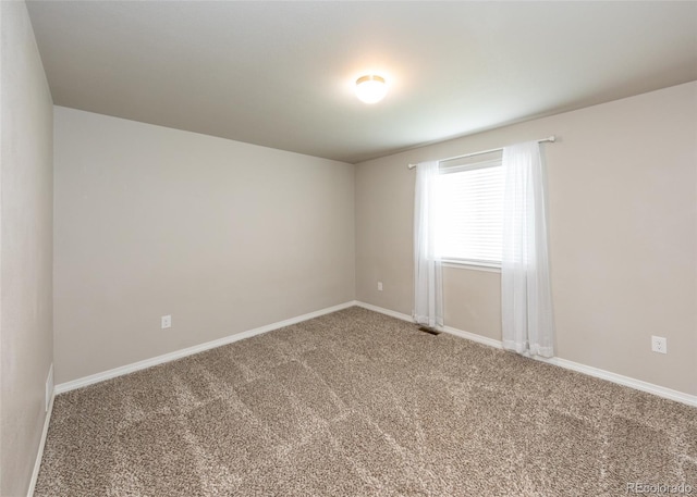 9835 Rubicon Dr, Colorado Springs, CO 80925 - spare room with carpet flooring and baseboards