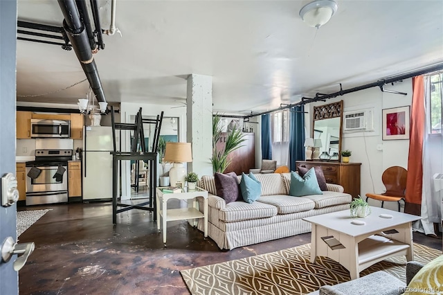 500 E 11th Ave Unit 101, Denver, CO 80203 - living room with a wall mounted air conditioner and finished concrete flooring