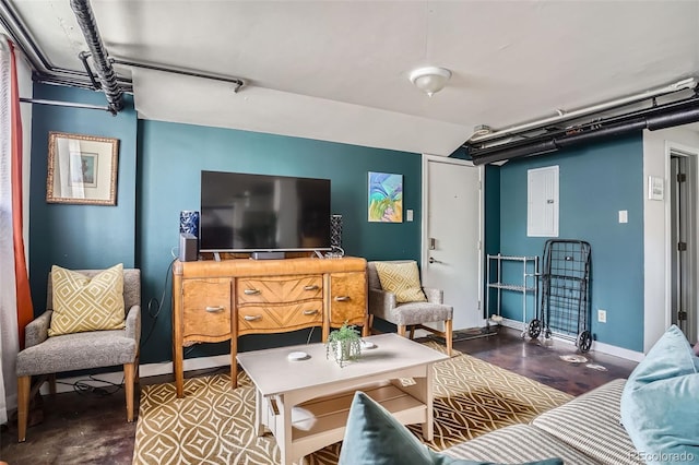 500 E 11th Ave Unit 101, Denver, CO 80203 - living area with electric panel and concrete flooring