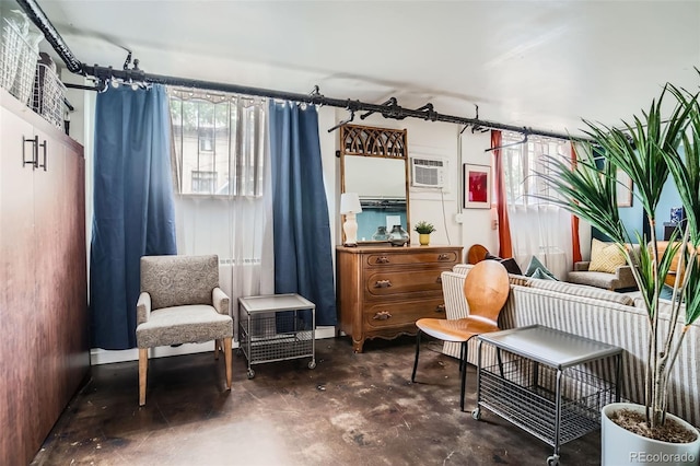 500 E 11th Ave Unit 101, Denver, CO 80203 - living area with concrete flooring and a wall unit AC
