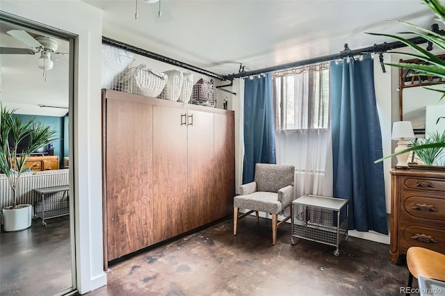 500 E 11th Ave Unit 101, Denver, CO 80203 - sitting room featuring finished concrete floors and ceiling fan