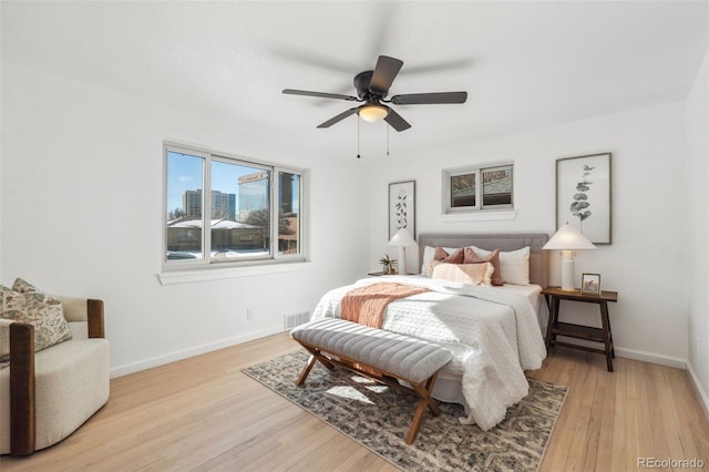 bedroom featuring ceiling fan and light wood-type flooring