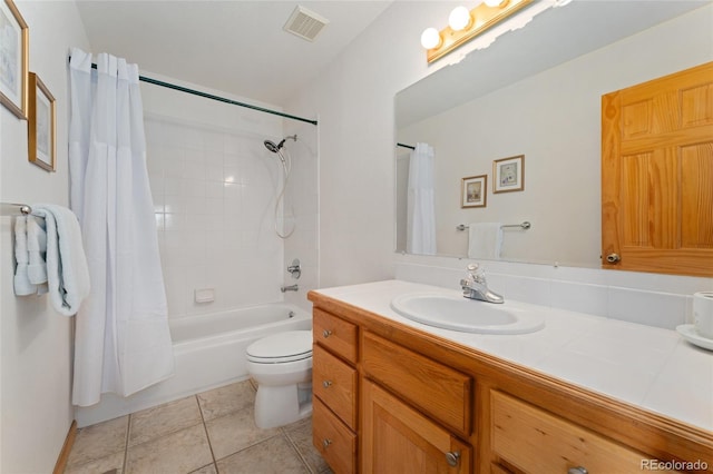 full bath featuring shower / bath combo, visible vents, toilet, vanity, and tile patterned flooring