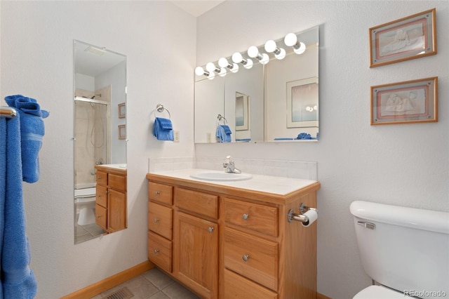 bathroom featuring vanity, tile patterned floors, an enclosed shower, toilet, and visible vents