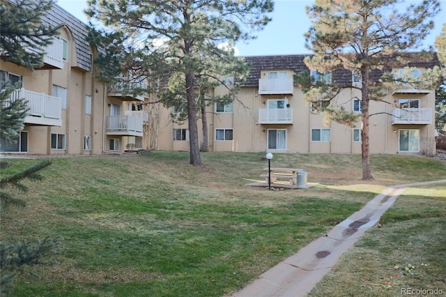 surrounding community featuring a lawn