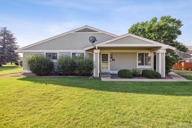 ranch-style house with a front lawn