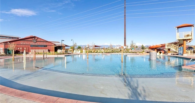 5672 Tramore Ct, Colorado Springs, CO 80927 - community pool featuring a water slide