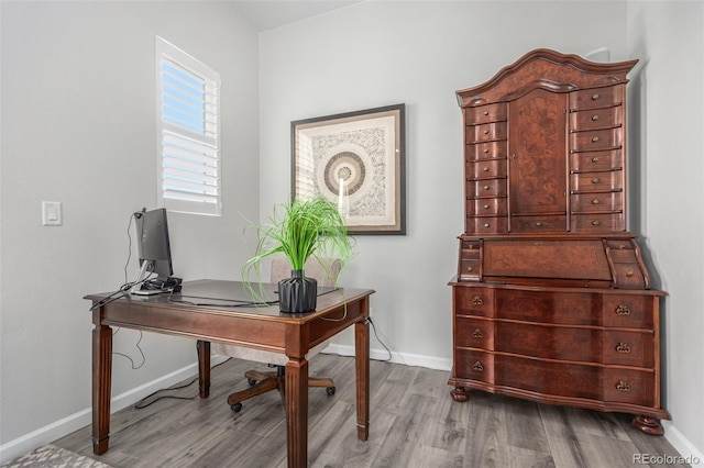 10524 Eby Cir, Lone Tree, CO 80124 - home office featuring wood finished floors and baseboards