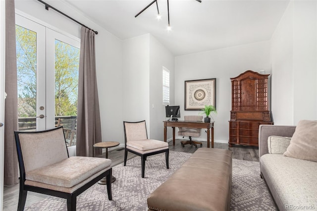 10524 Eby Cir, Lone Tree, CO 80124 - sitting room featuring wood finished floors, a desk, french doors, and baseboards