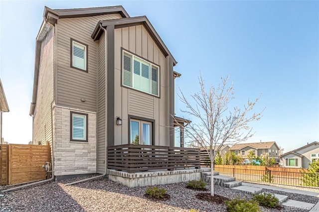 10524 Eby Cir, Lone Tree, CO 80124 - view of front of home with board and batten siding and stone siding