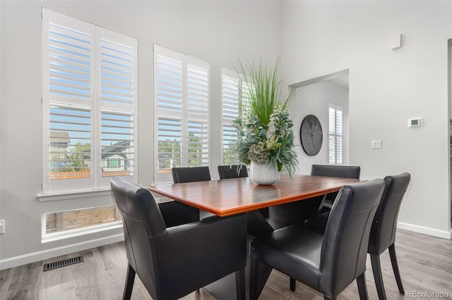 10524 Eby Cir, Lone Tree, CO 80124 - dining room featuring plenty of natural light and wood finished floors