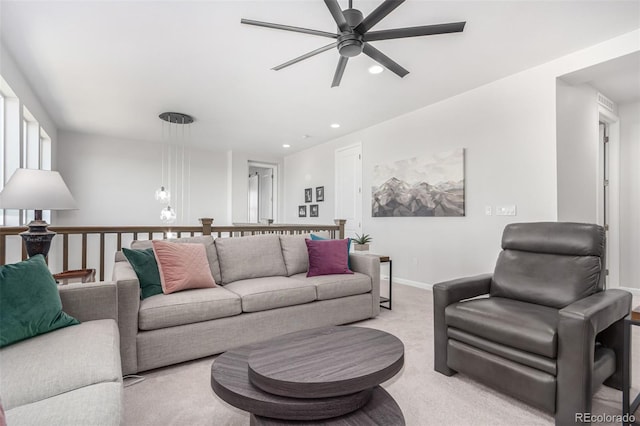 10524 Eby Cir, Lone Tree, CO 80124 - living area with light carpet, ceiling fan, and recessed lighting