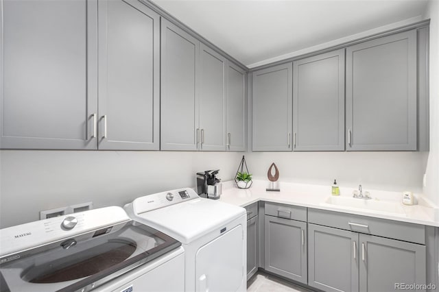 10524 Eby Cir, Lone Tree, CO 80124 - laundry room with cabinet space and washing machine and dryer