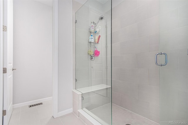 10524 Eby Cir, Lone Tree, CO 80124 - bathroom featuring a shower stall and tile patterned flooring