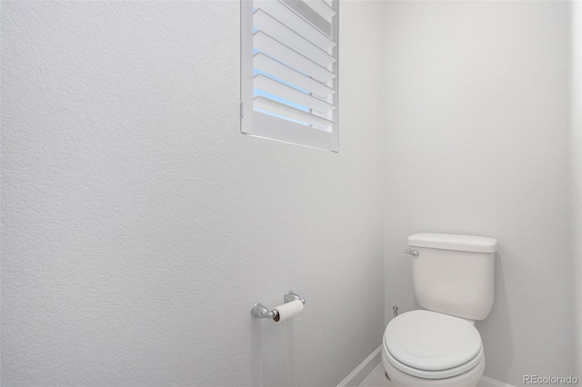 10524 Eby Cir, Lone Tree, CO 80124 - bathroom with baseboards and toilet