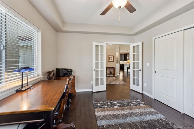 335 Mountain Brush, Colorado Springs, CO 80921 - office area with french doors, ceiling fan, wood finished floors, baseboards, and a tray ceiling