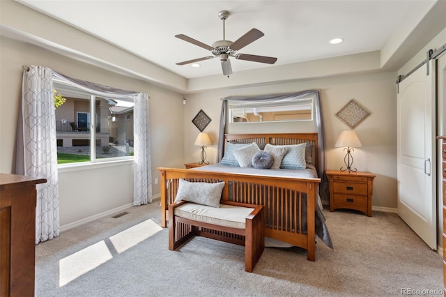 335 Mountain Brush, Colorado Springs, CO 80921 - carpeted bedroom featuring a barn door, baseboards, ceiling fan, and recessed lighting