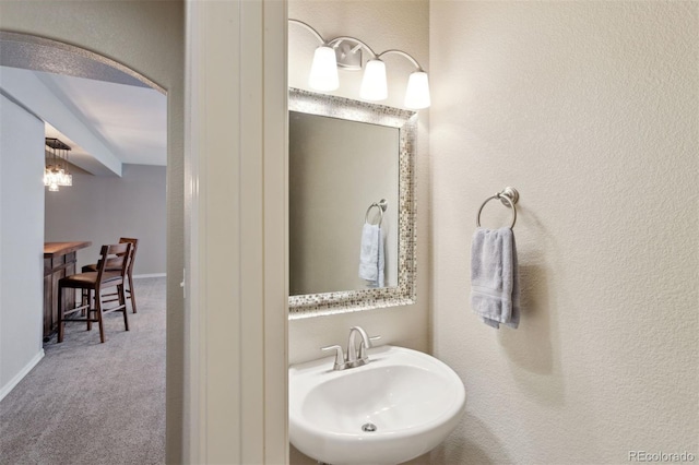 335 Mountain Brush, Colorado Springs, CO 80921 - bathroom featuring a sink and a textured wall