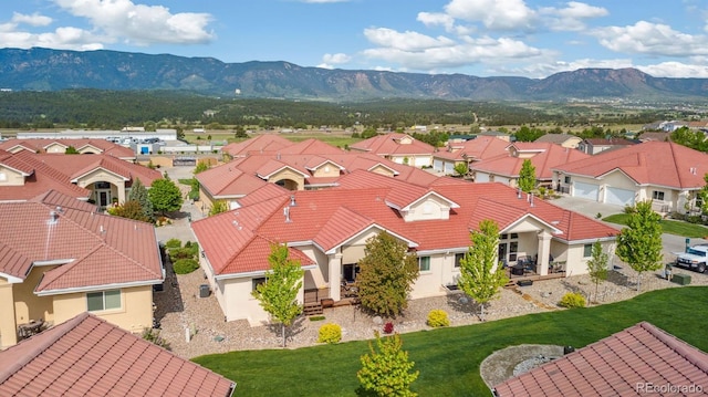 335 Mountain Brush, Colorado Springs, CO 80921 - aerial perspective of suburban area featuring a mountainous background