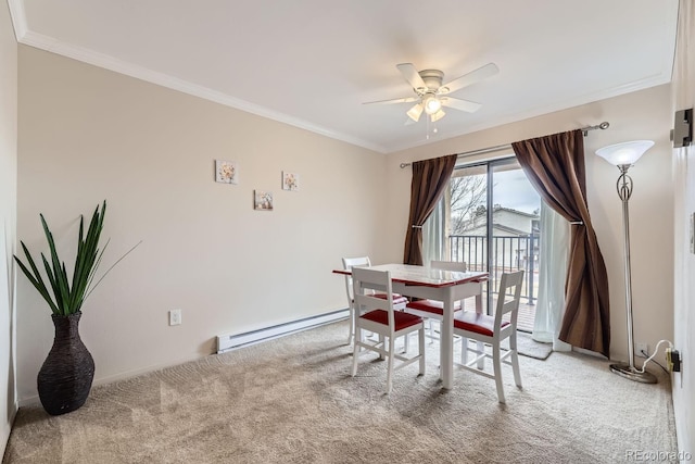 dining room with crown molding, ceiling fan, light carpet, and a baseboard heating unit