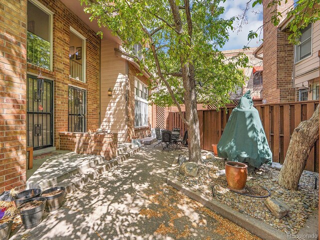 1011 N Pennsylvania St Unit H, Denver, CO 80203 - view of patio with a fenced backyard