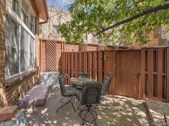 1011 N Pennsylvania St Unit H, Denver, CO 80203 - view of patio with fence and outdoor dining space