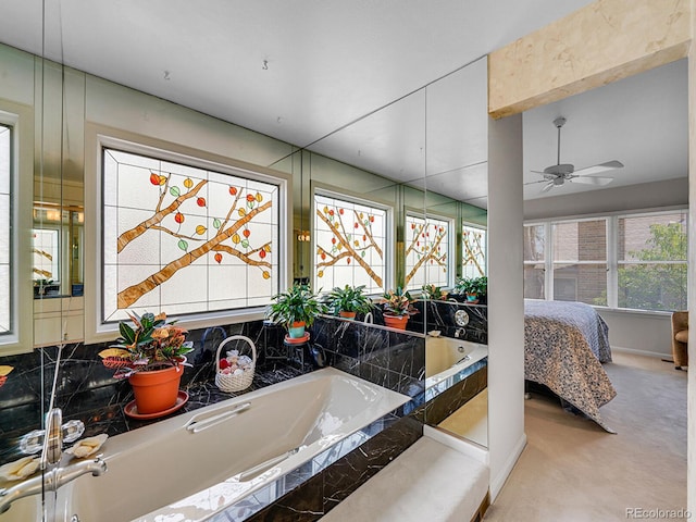 1011 N Pennsylvania St Unit H, Denver, CO 80203 - ensuite bathroom featuring a ceiling fan and a bath