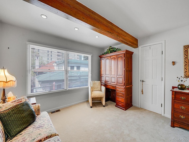 1011 N Pennsylvania St Unit H, Denver, CO 80203 - living area with light carpet, recessed lighting, baseboards, and beam ceiling