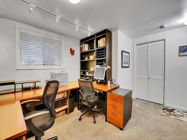 1011 N Pennsylvania St Unit H, Denver, CO 80203 - home office featuring track lighting and light colored carpet