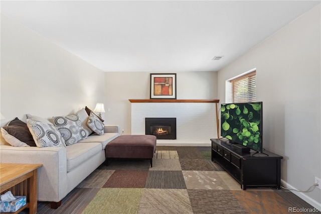 1853 S Zeno Way, Aurora, CO 80017 - living room with a fireplace and baseboards