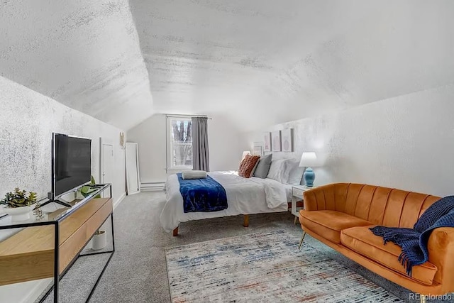 carpeted bedroom with a textured ceiling, a textured wall, a baseboard heating unit, and lofted ceiling