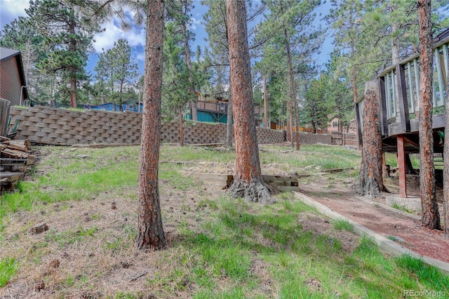 view of yard featuring fence
