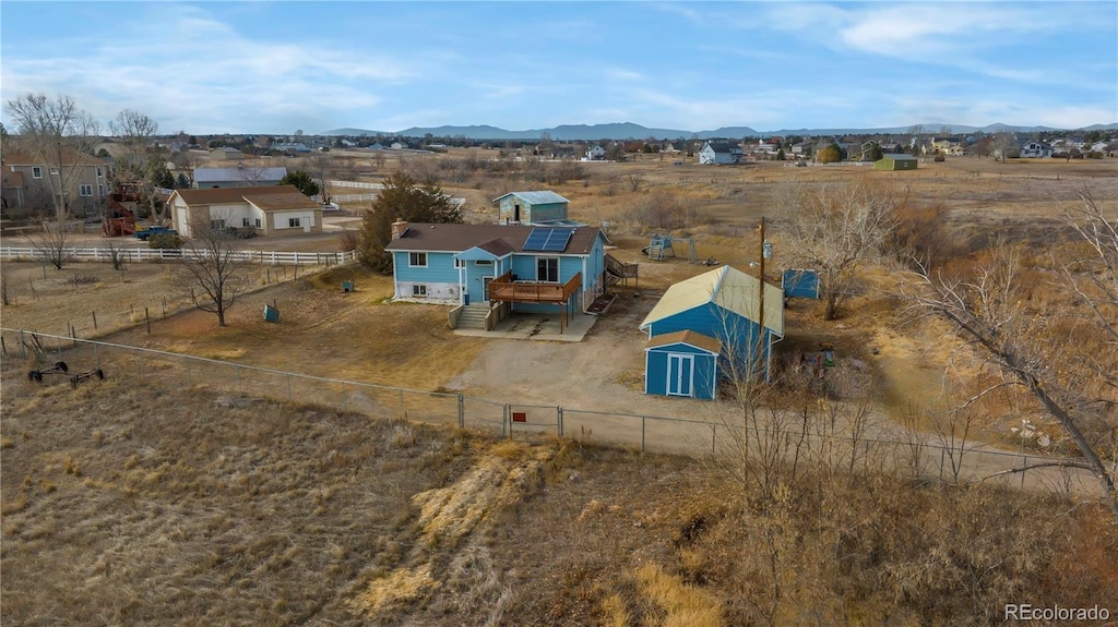 bird's eye view with a mountain view and a rural view