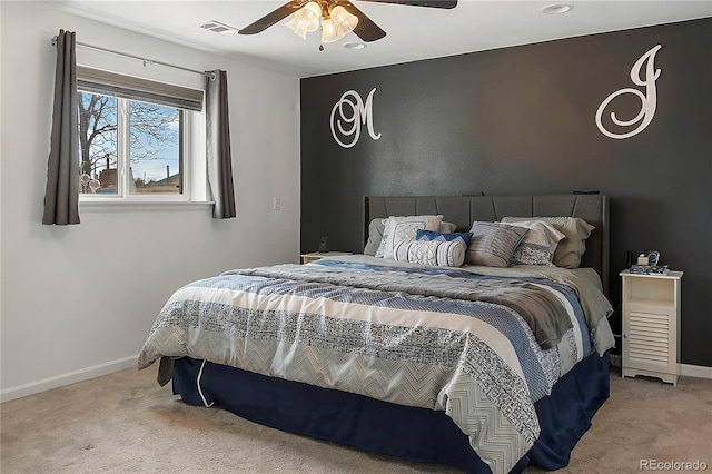 bedroom with ceiling fan and carpet floors