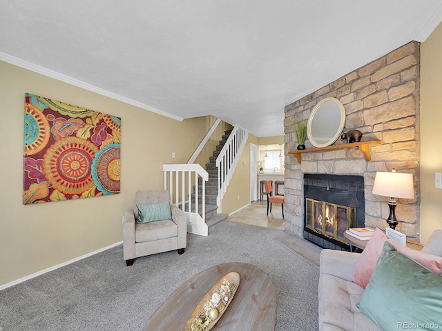 living room featuring crown molding, a fireplace, and carpet flooring