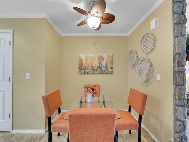 dining room with ceiling fan and ornamental molding