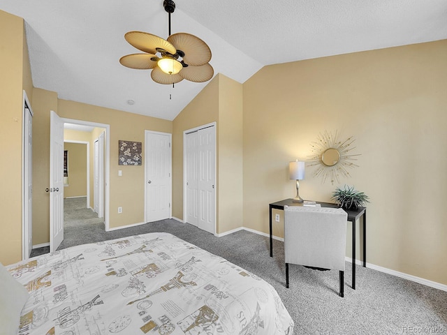 carpeted bedroom featuring vaulted ceiling, ceiling fan, and a closet