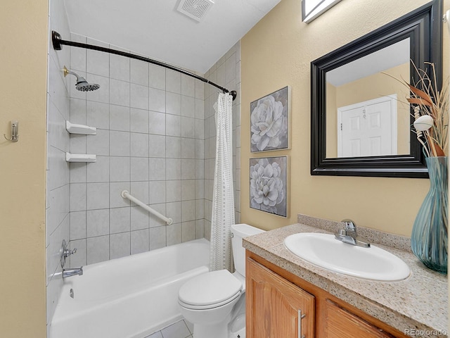 full bathroom featuring vanity, shower / tub combo, tile patterned floors, and toilet