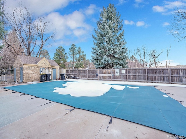 view of swimming pool featuring a patio area