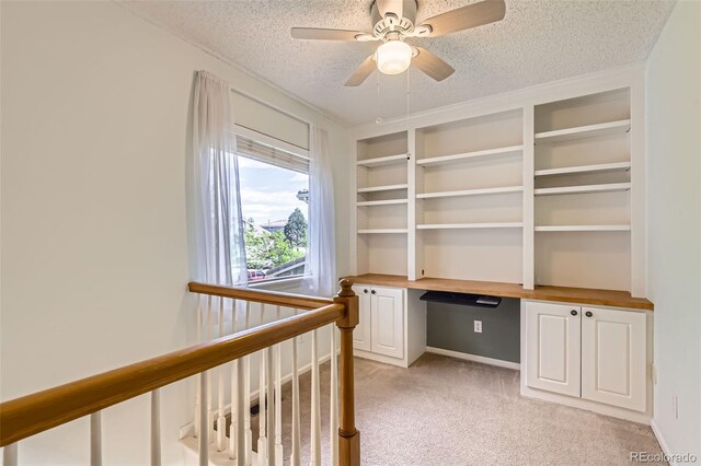 4081 Odessa St, Denver, CO 80249 - unfurnished office featuring a textured ceiling, light colored carpet, and a ceiling fan