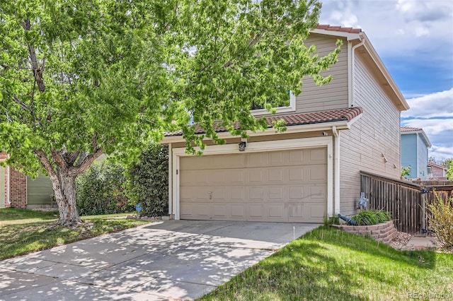 4081 Odessa St, Denver, CO 80249 - view of front of house with driveway, fence, and an attached garage