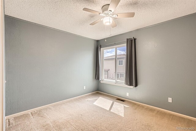 4081 Odessa St, Denver, CO 80249 - unfurnished room with a textured ceiling, carpet flooring, ceiling fan, and baseboards
