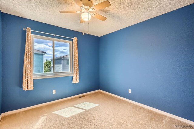 4081 Odessa St, Denver, CO 80249 - spare room featuring carpet, ceiling fan, a textured ceiling, and baseboards